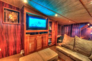 Ocean Hunter III lounge and media room with Cheesemans’ Ecology Safaris